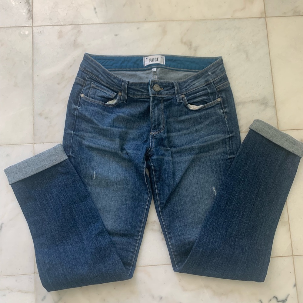 Dark blue, skinny with cuff jeans. Has some stretch